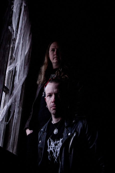 Devils Tail signs at Non Serviam Records
