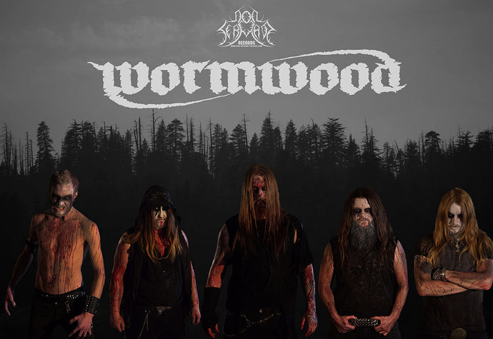WORMWOOD signs at Non Serviam Records